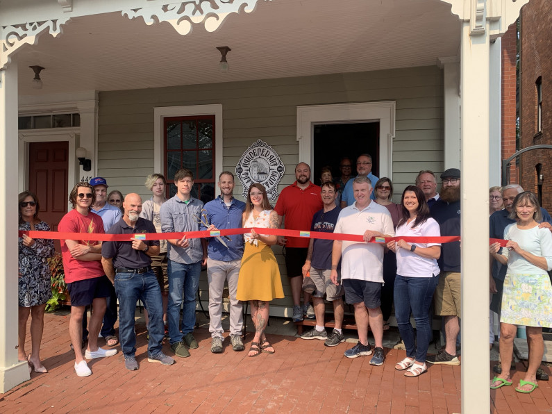 hardened art tattoo ribbon cutting